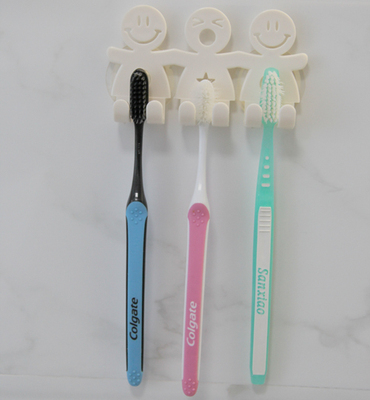 吸盘式卡通牙刷架 可爱笑脸牙具架 塑料小人物牙刷挂