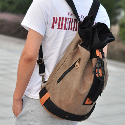 包邮韩版新款潮男女包包单肩双肩背包水桶包旅行包帆布包学生书包
